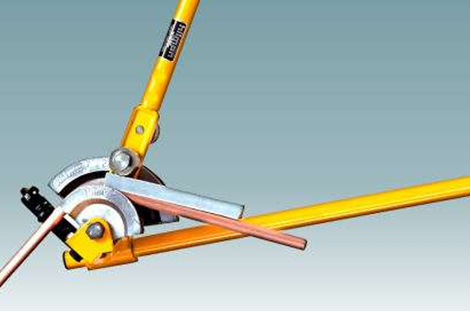 A lever type bender with the former, guide and stop visible