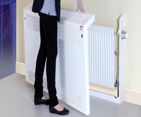 A radiator front panel being opened