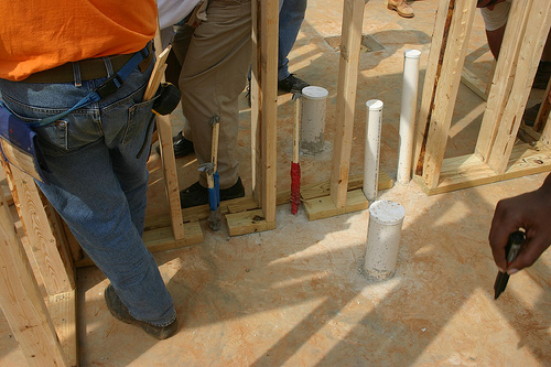 Pipework marked with tape and open ends capped during first fix