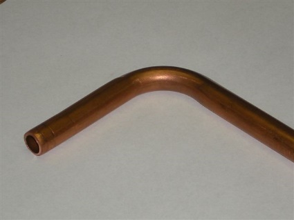 A formed bend in copper tube