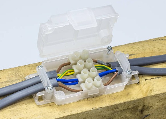 A maintenance free junction box fixed to a joist