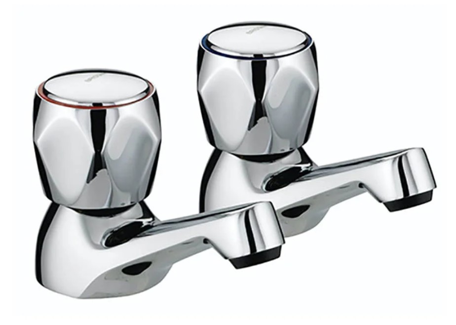 A pair of pillar taps with shrouded heads